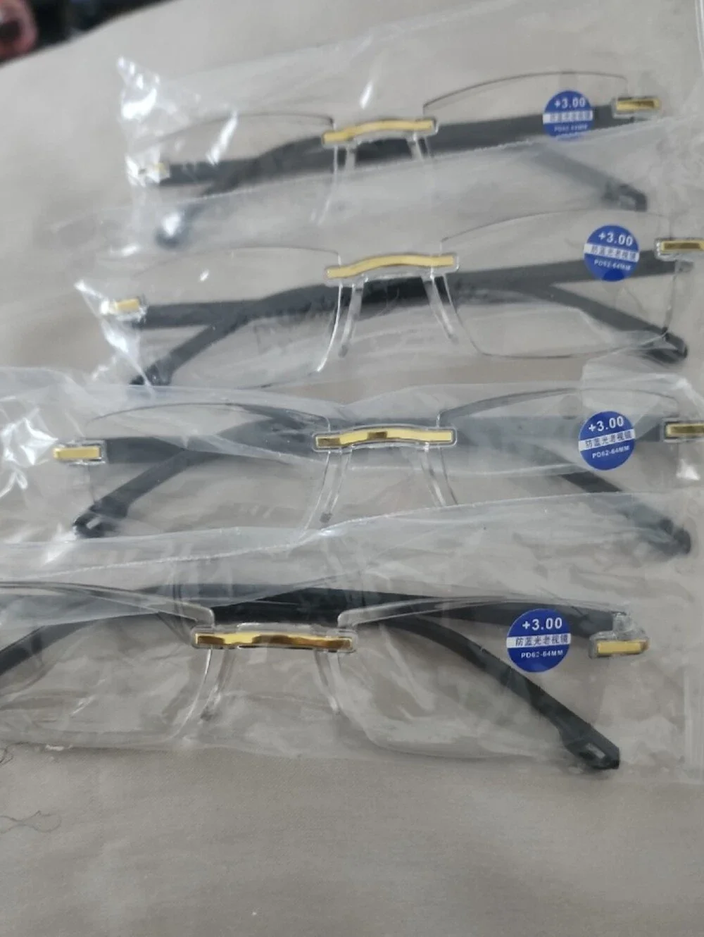 4 Pairs New Clear Rimless Reading Glasses with Gold Bridge 3.00 Strength
